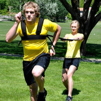 Thumbnail for Athletic explosive power training for resistance strength and speed training. No matter the sport, football, baseball, basketball, soccer, softball, lacrosse, tennis or rugby, strength and speed training is essential. This American Made Training Strap is designed to increase leg strength and speed while improving burst take off recovery and acceleration from a standing position.